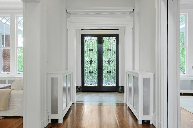 15 Calton Ln, New Rochelle, NY 10804 - entrance foyer featuring french doors and dark wood-style flooring