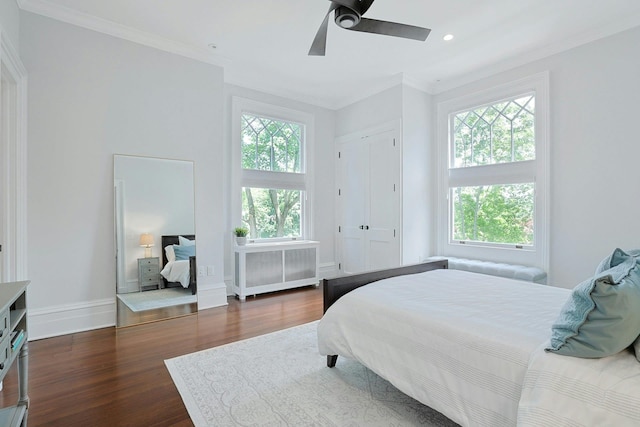 15 Calton Ln, New Rochelle, NY 10804 - bedroom with dark wood-style floors, ornamental molding, ceiling fan, recessed lighting, and radiator heating unit