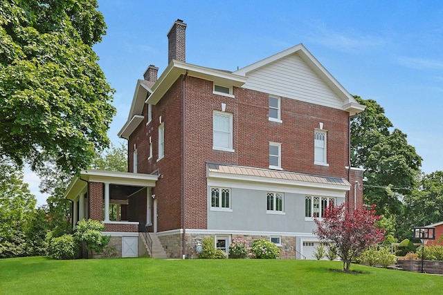 15 Calton Ln, New Rochelle, NY 10804 - back of property with a chimney, a lawn, and brick siding