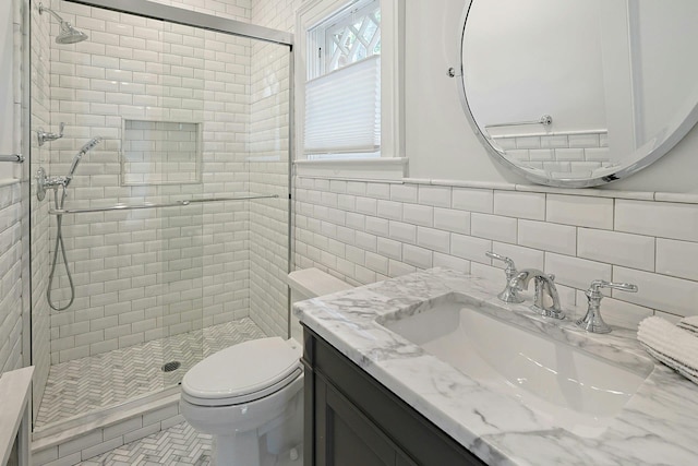 15 Calton Ln, New Rochelle, NY 10804 - full bathroom featuring a shower stall, vanity, and tile walls