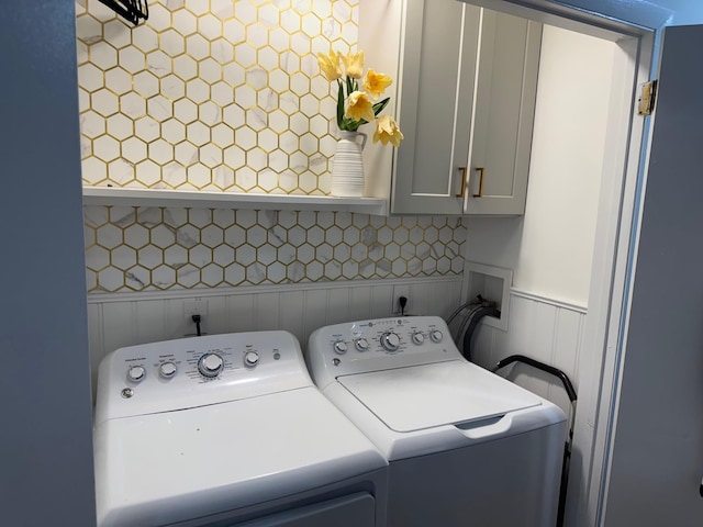 38 Offshore Dr, Mohegan Lake, NY 10547 - washroom with cabinet space, washing machine and dryer, and wainscoting