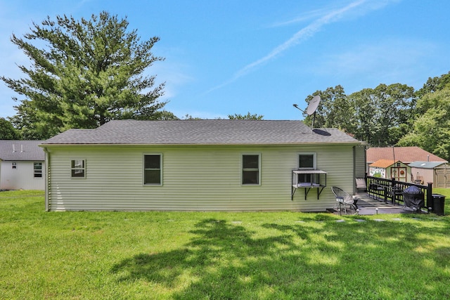 7 Brodie Rd # 17, Hopewell Junction, NY 12533 - back of property with a yard, a patio, and a shingled roof