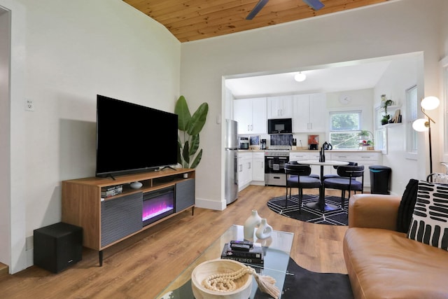 7 Brodie Rd # 17, Hopewell Junction, NY 12533 - living area with light wood finished floors, lofted ceiling, ceiling fan, and wooden ceiling