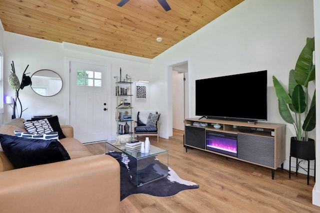 7 Brodie Rd # 17, Hopewell Junction, NY 12533 - living room featuring vaulted ceiling, wood ceiling, a ceiling fan, and wood finished floors