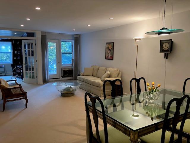 20 Chapel Pl Unit 1H, Great Neck, NY 11021 - carpeted dining area featuring recessed lighting