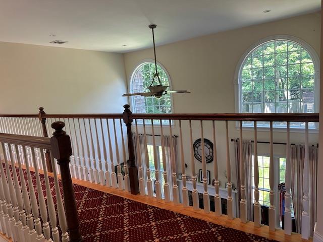1 Sunset Ave, East Quogue, NY 11942 - hallway with wood finished floors