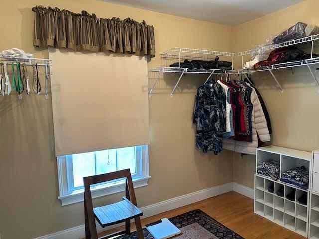 1 Sunset Ave, East Quogue, NY 11942 - walk in closet with wood finished floors