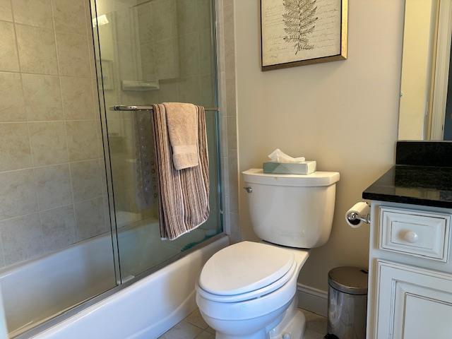 1 Sunset Ave, East Quogue, NY 11942 - full bathroom featuring vanity and combined bath / shower with glass door