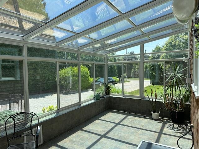 1 Sunset Ave, East Quogue, NY 11942 - view of unfurnished sunroom