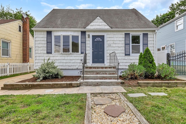 189 Jacob St, Elmont, NY 11003 - view of front of property featuring entry steps and roof with shingles