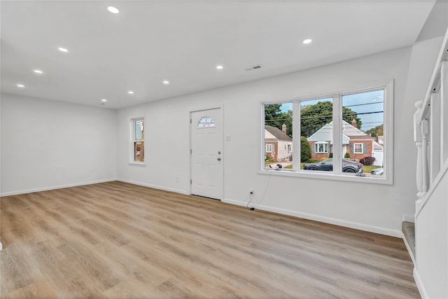189 Jacob St, Elmont, NY 11003 - entryway featuring light wood-style floors, recessed lighting, and stairs