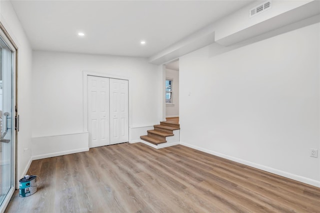 189 Jacob St, Elmont, NY 11003 - interior space featuring wood finished floors, recessed lighting, and a closet