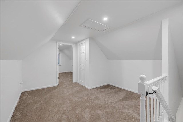 189 Jacob St, Elmont, NY 11003 - bonus room with carpet flooring, vaulted ceiling, recessed lighting, and attic access