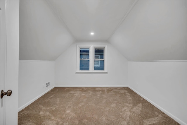 189 Jacob St, Elmont, NY 11003 - additional living space featuring carpet floors and lofted ceiling
