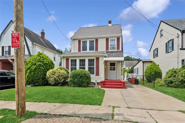 35 Juniper Ave, Mineola, NY 11501 - view of front of property featuring a chimney