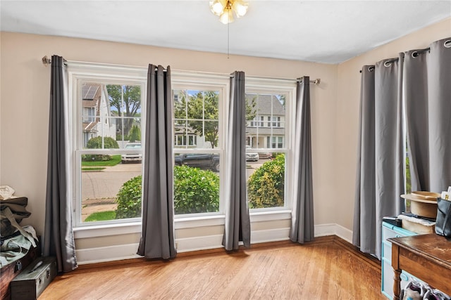 35 Juniper Ave, Mineola, NY 11501 - dining room with healthy amount of natural light and light wood finished floors