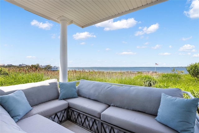580 Dune Rd Unit 5, Westhampton, NY 11978 - view of patio featuring an outdoor living space and a water view