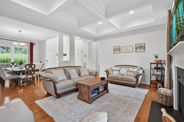 2 Primrose Ln, Chester, NY 10918 - living area with a fireplace with flush hearth, coffered ceiling, a chandelier, crown molding, and beamed ceiling