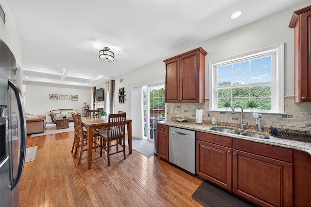2 Primrose Ln, Chester, NY 10918 - kitchen with stainless steel dishwasher, light wood-style flooring, tasteful backsplash, light stone countertops, and recessed lighting