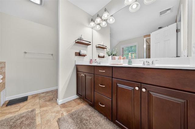 2 Primrose Ln, Chester, NY 10918 - full bath with double vanity, a shower with shower door, and vaulted ceiling