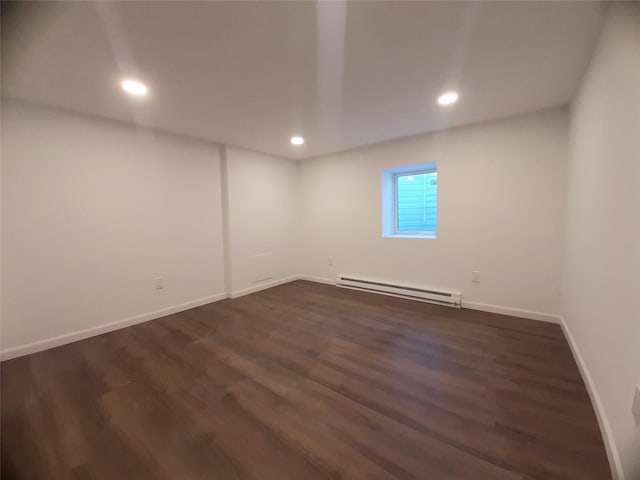 8 Poplar St, Poughkeepsie, NY 12601 - unfurnished room with baseboard heating, recessed lighting, and dark wood-style flooring