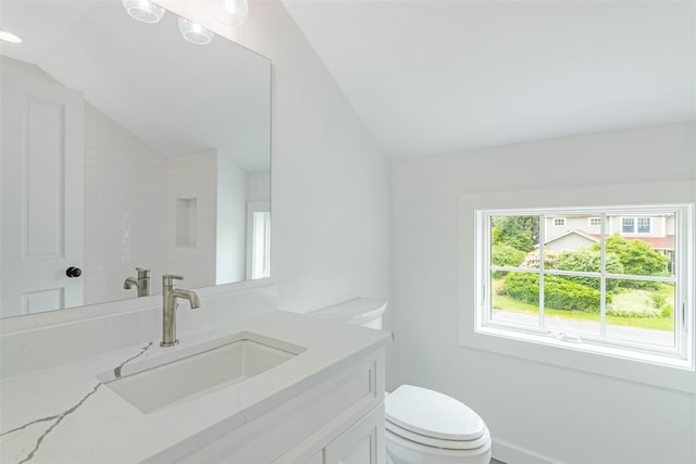 130 Sunset Ln, Greenport, NY 11944 - bathroom featuring vaulted ceiling and vanity
