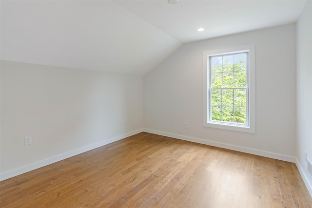 130 Sunset Ln, Greenport, NY 11944 - additional living space featuring vaulted ceiling, light wood-style flooring, and recessed lighting