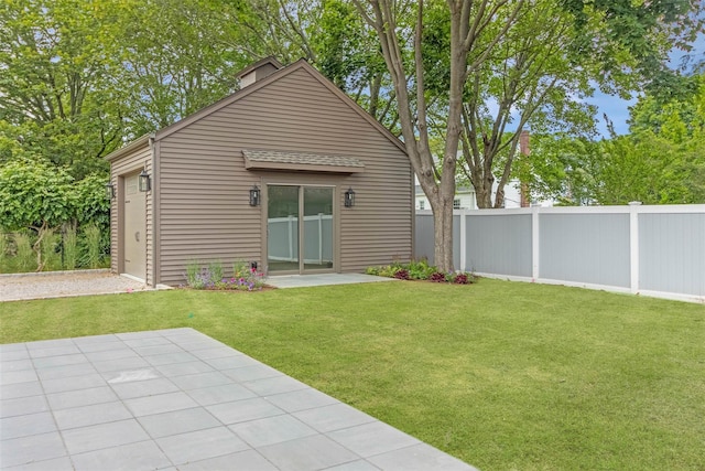 130 Sunset Ln, Greenport, NY 11944 - rear view of house with a patio