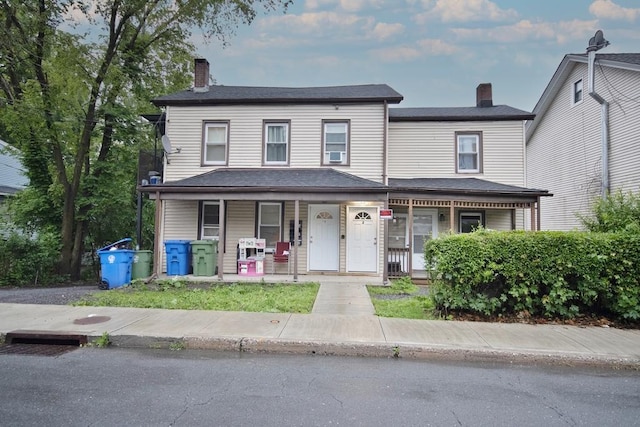 11 E Ave, Middletown, NY 10940 - view of property with covered porch and a chimney