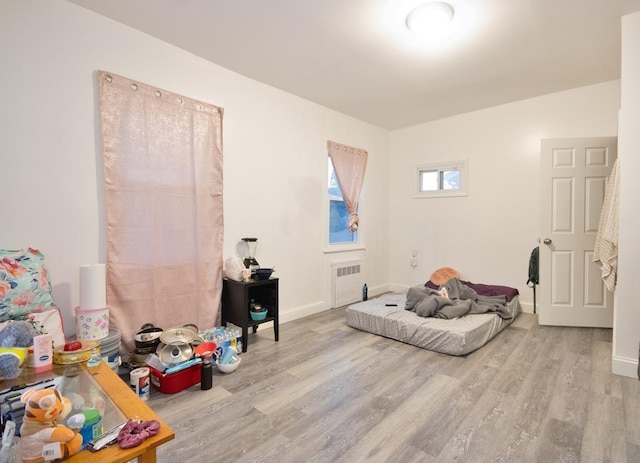 11 E Ave, Middletown, NY 10940 - bedroom with radiator heating unit and wood finished floors