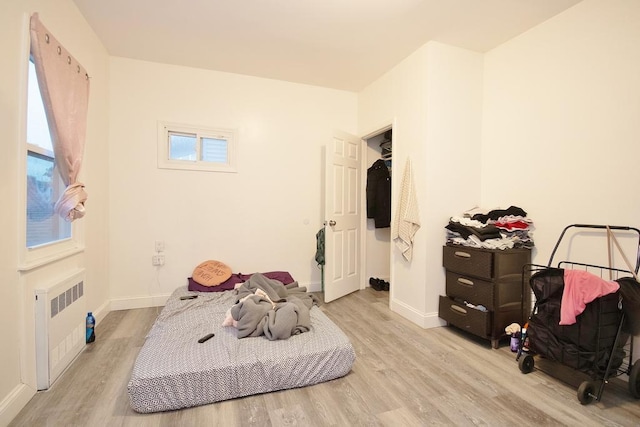 11 E Ave, Middletown, NY 10940 - bedroom featuring radiator heating unit and wood finished floors