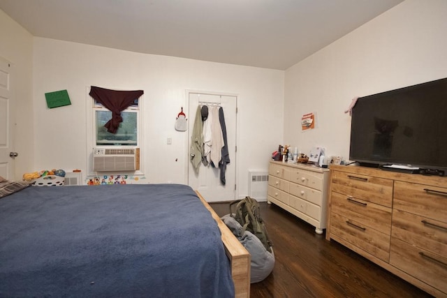 11 E Ave, Middletown, NY 10940 - bedroom with dark wood-style flooring and cooling unit