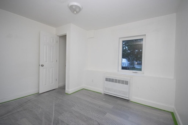 11 E Ave, Middletown, NY 10940 - spare room featuring radiator heating unit and baseboards