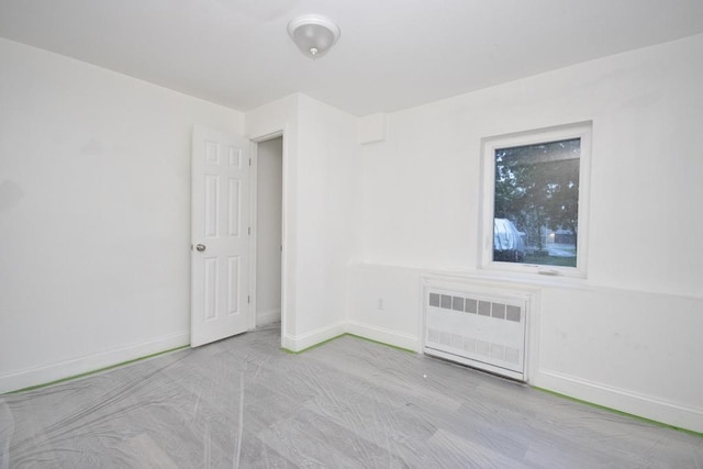 11 E Ave, Middletown, NY 10940 - spare room with radiator heating unit and baseboards