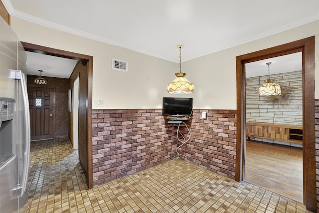 25 Tappan Ter, Briarcliff Manor, NY 10510 - kitchen with stainless steel fridge with ice dispenser, wainscoting, ornamental molding, and hanging light fixtures
