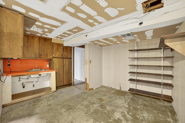 25 Tappan Ter, Briarcliff Manor, NY 10510 - below grade area with a sink and wood walls