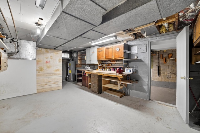25 Tappan Ter, Briarcliff Manor, NY 10510 - unfinished basement with gas water heater and a workshop area