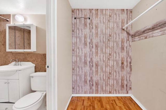 2035 Central Park Ave Unit 3M, Yonkers, NY 10710 - bathroom with vanity, a shower with shower curtain, and wood finished floors