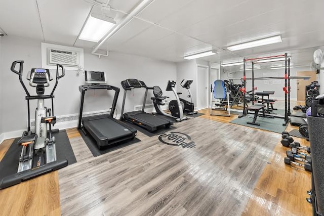 2035 Central Park Ave Unit 3M, Yonkers, NY 10710 - gym with wood finished floors and an AC wall unit