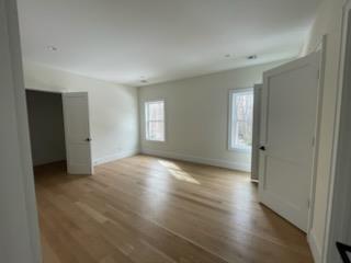 53 Calvin Ave, Syosset, NY 11791 - spare room with wood finished floors