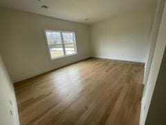 53 Calvin Ave, Syosset, NY 11791 - unfurnished room with wood finished floors