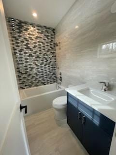 53 Calvin Ave, Syosset, NY 11791 - full bathroom with vanity, washtub / shower combination, recessed lighting, and tile walls