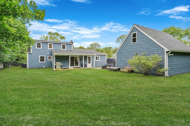 6 Youngs Ln, Setauket, NY 11733 - back of property featuring a chimney