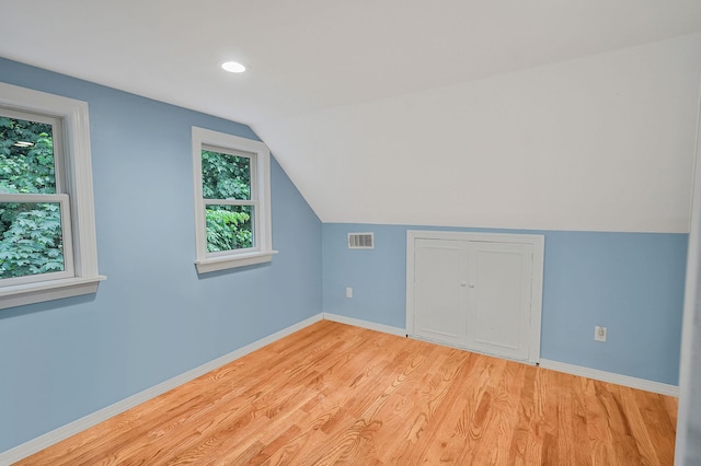 6 Youngs Ln, Setauket, NY 11733 - bonus room with light wood-type flooring, lofted ceiling, and recessed lighting