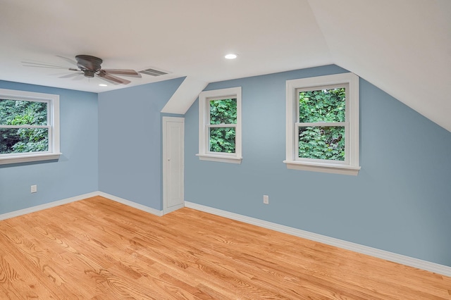 6 Youngs Ln, Setauket, NY 11733 - bonus room with plenty of natural light, light wood finished floors, vaulted ceiling, and a ceiling fan
