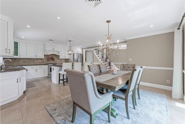 709 Demott Ct, Westbury, NY 11590 - dining room featuring a chandelier, recessed lighting, light tile patterned floors, and crown molding