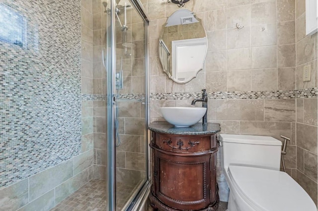 709 Demott Ct, Westbury, NY 11590 - bathroom with a shower stall, vanity, and tile walls
