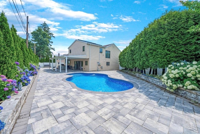 709 Demott Ct, Westbury, NY 11590 - view of pool with a patio and a fenced backyard