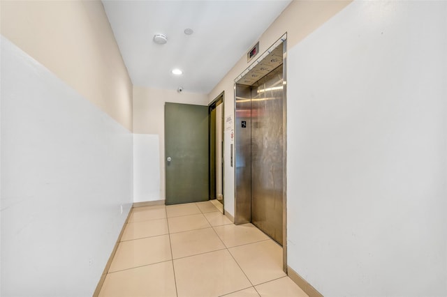 41-38 College Point Blvd Unit 4A, Flushing, NY 11355 - hallway with elevator, light tile patterned flooring, and recessed lighting