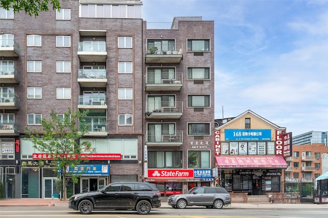 41-38 College Point Blvd Unit 4A, Flushing, NY 11355 - view of apartment building / complex with view of commercial area